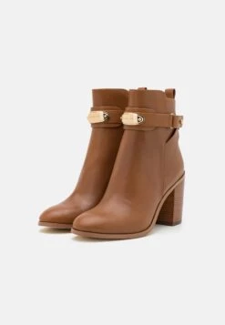 MICHAEL Michael Kors Darcy Heeled - Ankle Boots - Brown -Stride Shop 18cd81339fc14efca66449e0db8ee7fa