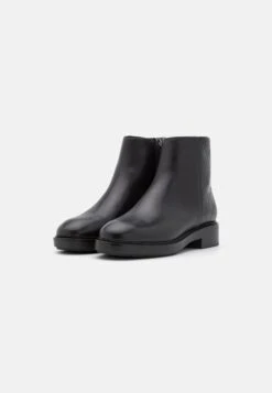 Calvin Klein Mix - Classic Ankle Boots - Black -Stride Shop 1ce7c19f6b314c3d9890bb555dfd96bf