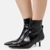 MICHAEL Michael Kors Kadence - Classic Ankle Boots -Stride Shop 25ccd99406354e73b13da489335f67db