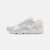 Nike Sportswear Air Huarache Runner Unisex - Trainers - Summit White/Metallic Silver/White -Stride Shop 265c317f2bc549678dd36f9629f8a424