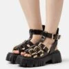 Buffalo Vegan Lion Teeth - Sandals -Stride Shop 2ded8b8d9cea4c66a4a317673c5adc01