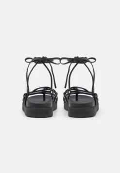 Calvin Klein Ergo Strap Sandal - T-Bar Sandals - Black -Stride Shop 35a57ce35ea64dec89f305616711fa79