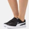 Puma Carina 2.0 - Trainers - Black/White/Silver -Stride Shop 35e20ef6f09b4d9da12a875540dc12b9
