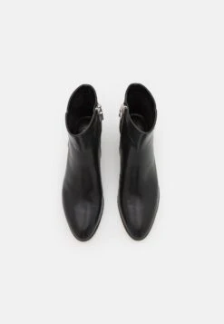 MICHAEL Michael Kors Madelyn Bootie - Classic Ankle Boots - Black -Stride Shop 404298e03719411988a15f4c53cc964b