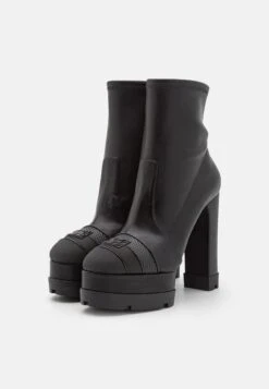 Casadei Nancy Toe Cap - Platform Ankle Boots -Stride Shop 4329105f66d3426c9d4060bf2fbf2539