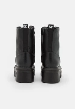 KOI FOOTWEAR Talwar Chunky Stomper Boots - Platform Ankle Boots - Black 11 KOI FOOTWEAR Talwar Chunky Stomper Boots - Platform Ankle Boots - Black -Stride Shop 44ab052d35bf480a9097f38f2a31af31