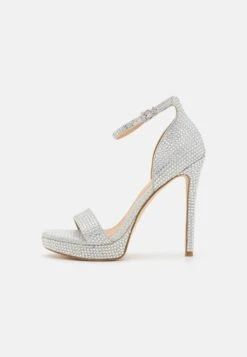 MICHAEL Michael Kors Jordyn Platfrom- Platform Sandals - Silver -Stride Shop 4cc8da264b2a4f448028268077263133