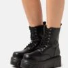 KOI FOOTWEAR Talwar Chunky Stomper Boots - Platform Ankle Boots - Black -Stride Shop 50542d61a82345b8a751d3066279b5e7