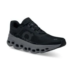 On | Women's Cloudmonster Running Shoes - Black 9 On | Women's Cloudmonster Running Shoes - Black -Stride Shop 61.99024 W On Cloudmonster frontside