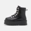 KOI FOOTWEAR Hydra Matrix Platform Boots - Platform Ankle Boots - Black -Stride Shop 66c77c41eb224bc39bd23673dbcb5bb2