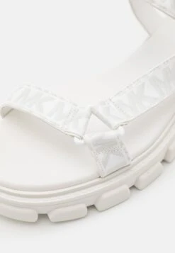 MICHAEL Michael Kors Ridley - Sandals - Optic White -Stride Shop 7ee15d5f45364b7e8d9a46fe3ef54101