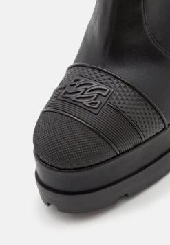 Casadei Nancy Toe Cap - Platform Ankle Boots -Stride Shop 85cad630f7b2478bbc94f4b1a05ad9cb