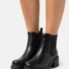 Madden Girl Tessa - Platform Ankle Boots - Black Paris -Stride Shop 9112502a881f4ff48c15db1a3b0ba159