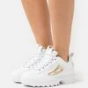 Fila Disruptor M Wmn - Trainers 1 Fila Disruptor M Wmn - Trainers -Stride Shop 981fc59b48394fe59a6440e37b843aa5