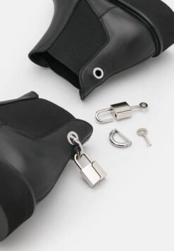 Christopher Kane Ankle Boots - Ankle Boots -Stride Shop 99467f7dc6604a92a744cb1e15364089