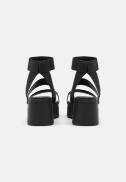 Call It Spring Vegan Shelbyy - Platform Sandals - Black -Stride Shop 9969c813c994477b80a8f0c92b6e69ce
