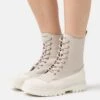 Calvin Klein Jeans Chunky Combat Laceup Boot- Lace-Up Ankle Boots - Eggshell/Creamy White -Stride Shop 9c39a4121590442b952b81964ba016ba
