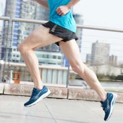 Mizuno | Men's Wave Rider 25 Running Shoes - Gibraltar Sea -Stride Shop M Mizuno waverider lifestyle2