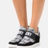 DKNY Cosmos Wedge- Trainers - Black/White -Stride Shop f57e415f09cb4b7dba2c4712e475394d