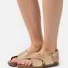 Ugg Solivan Slingback - Sandals - Pale Gold Metallic -Stride Shop f82f066c61f44ead8b7f1c3605e3650f